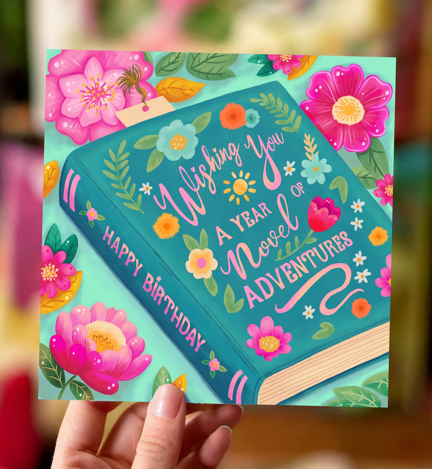 Kaart felicitatie verjaardag boek blauw met bloemen vrolijk